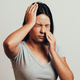 Woman with sinus problems