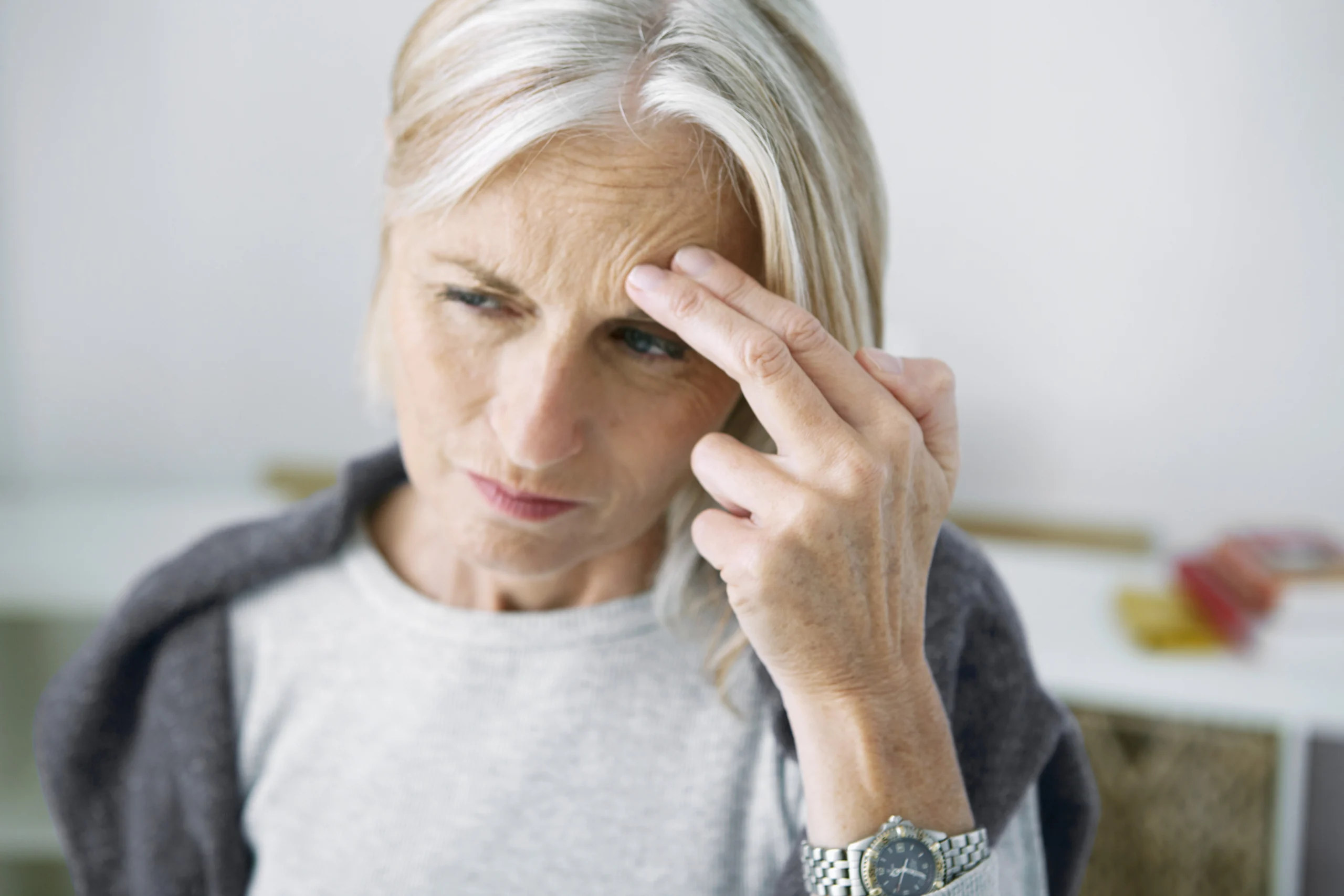 Older woman with a headache