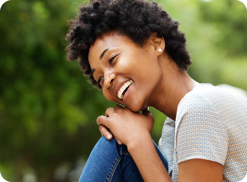 Woman outside smiling